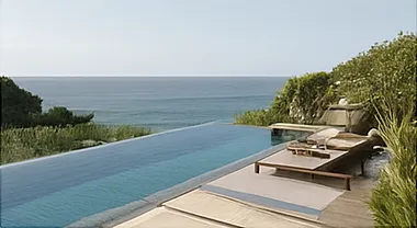Luxury hotel with infinity pool overlooking the ocean